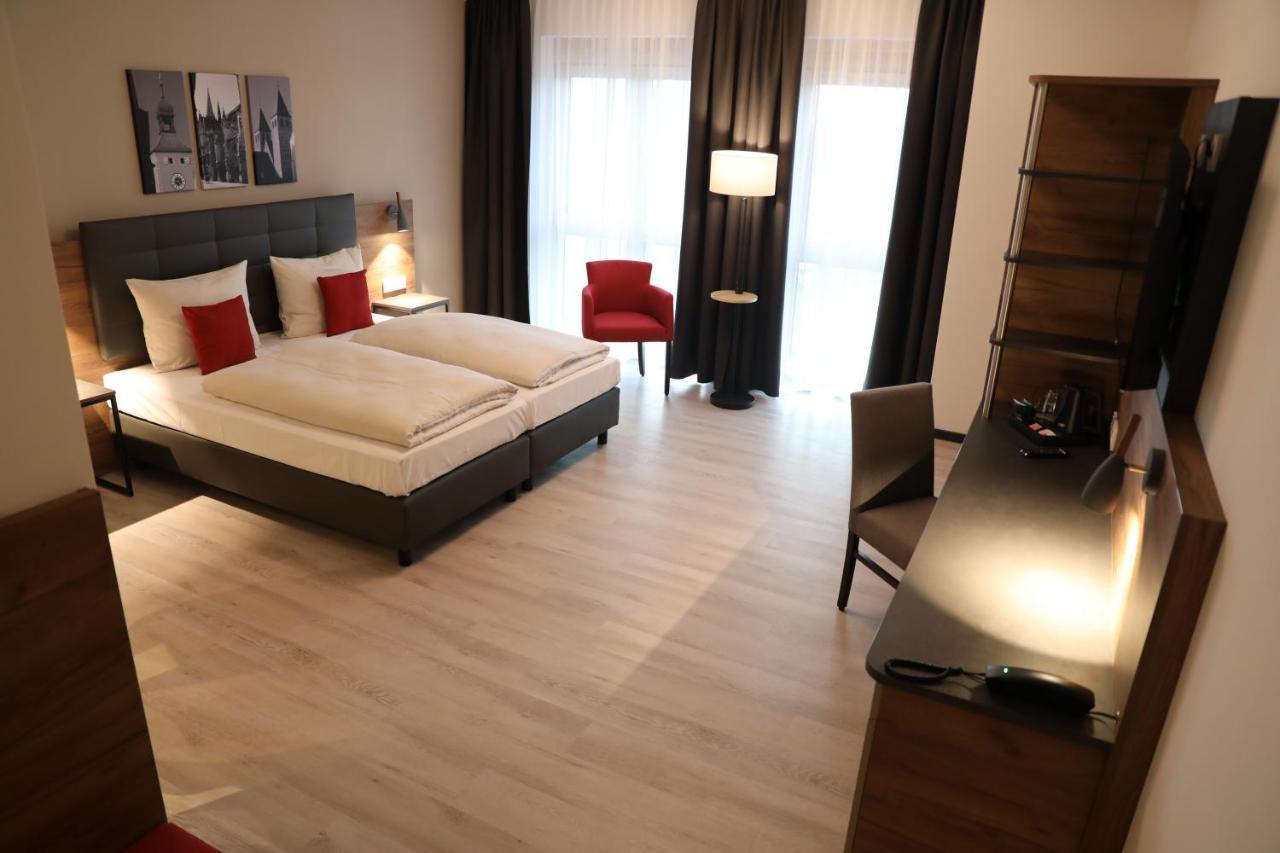 Hotel Includio Ratisbona Quarto foto
